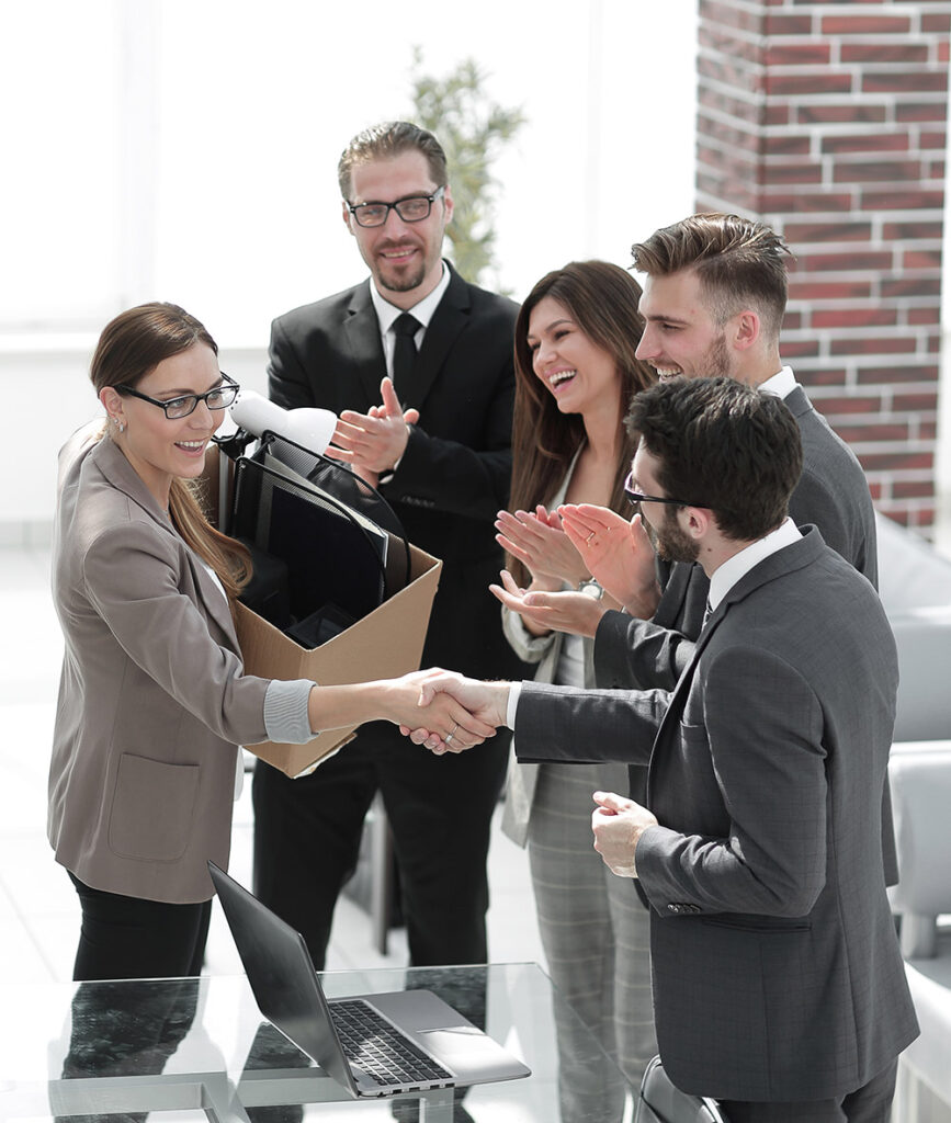 boss shaking hands with a new employee