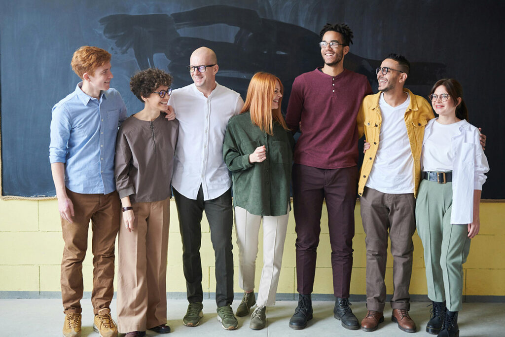 People Standing Beside Board